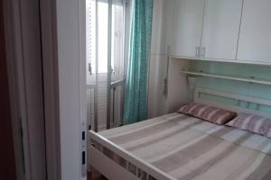 Ένα ή περισσότερα κρεβάτια σε δωμάτιο στο Casa al mare ingresso indipendente