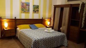 Giường trong phòng chung tại Appartamentino Cinisi