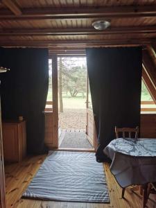 Fotografie z fotogalerie ubytování Domek letniskowy nad jeziorem v destinaci Marksoby