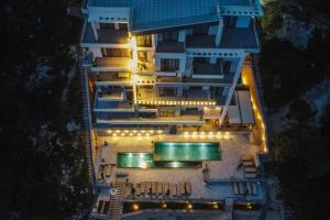 an aerial view of a building at night at Dollaku Apartments in Bar