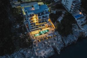 an aerial view of a building with lights at Dollaku Apartments in Bar