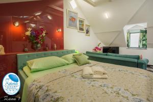 Posteľ alebo postele v izbe v ubytovaní Zana Luxury Studios Split center