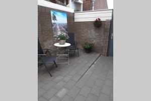 Balkón nebo terasa v ubytování Zomerhuis Strand 28
