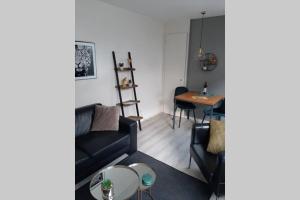 Posezení v ubytování Zomerhuis Strand 28