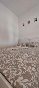 Postel nebo postele na pokoji v ubytování Apartmani Dejan