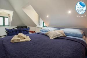 Posteľ alebo postele v izbe v ubytovaní Zana Luxury Studios Split center