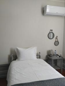 Postel nebo postele na pokoji v ubytování Casa Archie
