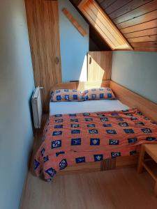 Una cama o camas en una habitación de Sobe Tanja