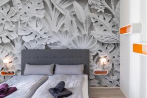 Una cama o camas en una habitación de K³ in Ilmenau