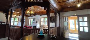 a dining room with a table in a house at Hotel Mitikas in Livádion