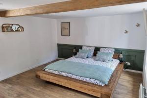 Postel nebo postele na pokoji v ubytování Au gré de Cassel