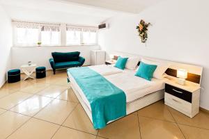 Un pat sau paturi într-o cameră la Vila Mosel