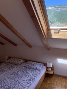 Łóżko lub łóżka w pokoju w obiekcie Platzlhof