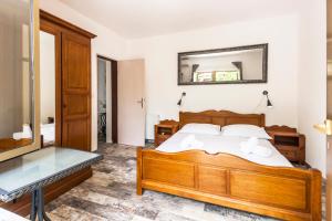 Posteľ alebo postele v izbe v ubytovaní Apartments & Rooms Strčić Petra