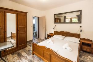 Posteľ alebo postele v izbe v ubytovaní Apartments & Rooms Strčić Petra