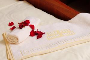 Postel nebo postele na pokoji v ubytování Hotel Alte Post Garni