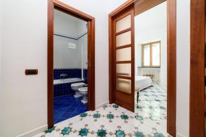 Posteľ alebo postele v izbe v ubytovaní Amalfi Coast Family Luxury Suite + 37 fotografií