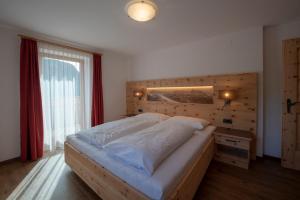 Postel nebo postele na pokoji v ubytování Appartment Kirch Neuhaus