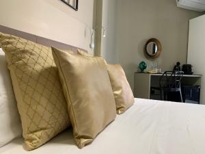 Posteľ alebo postele v izbe v ubytovaní GREEN-HOUSE® B&B Lecce