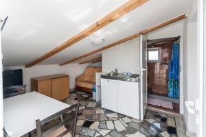 Kuchyňa alebo kuchynka v ubytovaní Apartments & Rooms Strčić Petra
