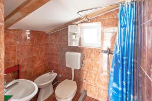 Kúpeľňa v ubytovaní Apartments & Rooms Strčić Petra