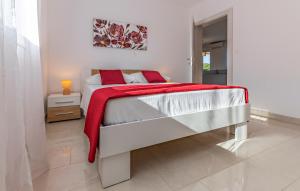 Postel nebo postele na pokoji v ubytování Apartman Leon