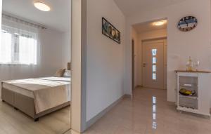 Postel nebo postele na pokoji v ubytování Apartman Leon