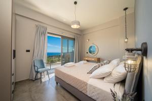 Ένα ή περισσότερα κρεβάτια σε δωμάτιο στο villa Shades of blue +75 φωτογραφίες