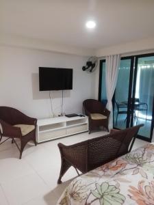 TV a/nebo společenská místnost v ubytování Flat Nord Tabatinga