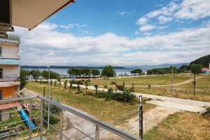a view of the water from a balcony of a building at Eceabat Doğa Pansiyon-Hotel in Eceabat