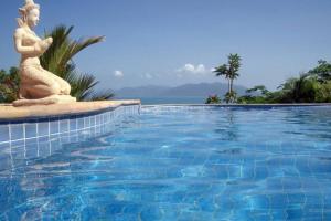 a swimming pool with a statue next to the water at 4 Bedroom 300 degrees Sea View Villa SDV139A-By Samui Dream Villas in Koh Samui  +36 photos