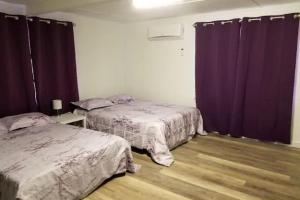 Postel nebo postele na pokoji v ubytování Unity House