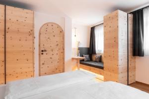 Posteľ alebo postele v izbe v ubytovaní Garni Hotel Tauber