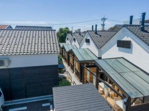 an overhead view of roofs of buildings at B&B MIKAWA 5 - Villas with BBQ Terrace in Kanazawa