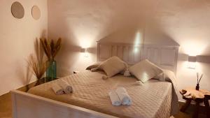 מיטה או מיטות בחדר ב-Madera Blanca