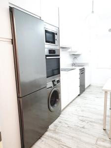 A kitchen or kitchenette at APARTAMENTO VISTAS AL MAR Sanxenxo