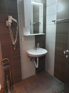 Ванная комната в Lux Apartman Ristić 1