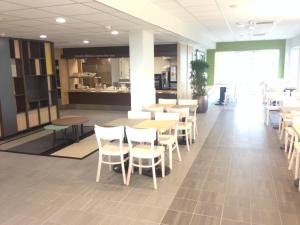 Restaurace v ubytování B&B HOTEL Lyon Sud États-Unis