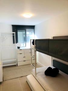 Posteľ alebo postele v izbe v ubytovaní SunAndBed Punta del Cavall