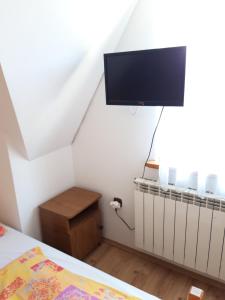 TV a/nebo společenská místnost v ubytování Pod Tatarską Górą