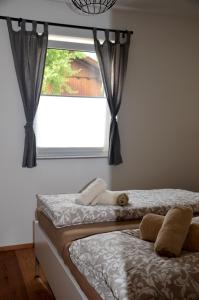 Posteľ alebo postele v izbe v ubytovaní Appartement HANNE