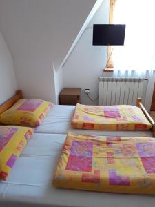 Postel nebo postele na pokoji v ubytování Pod Tatarską Górą