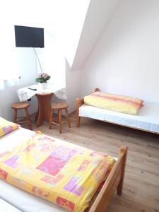 Postel nebo postele na pokoji v ubytování Pod Tatarską Górą