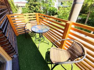 A balcony or terrace at Apartman Panorama Park & Free Parking