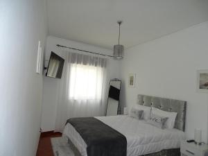 Postel nebo postele na pokoji v ubytování Enchanted Villa