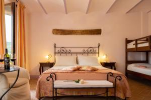 Postel nebo postele na pokoji v ubytování Agriturismo Colle Pu