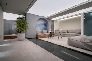Posezení v ubytování Caravel Suites - Adults Only