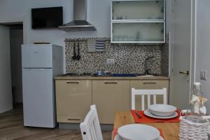 Cucina o angolo cottura di B&B Sea and Garden