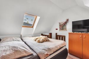 Postel nebo postele na pokoji v ubytování Rezidence Rokytnice