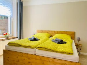 Llit o llits en una habitació de Ferienapartment HarzZeit